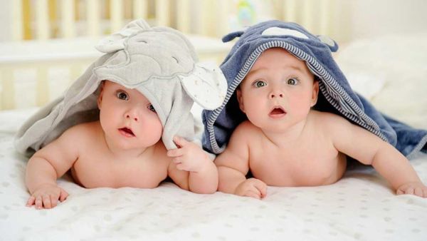رؤية توأم صبيان في المنام للمتزوجة والعزباء 1 رؤية توأم صبيان في المنام